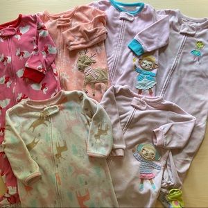 Six pairs of 12 month footie pajamas